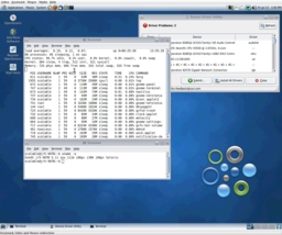 running OpenSolaris … note the ABI designation from uname -a, as well as the information in top and the device driver utility in the background